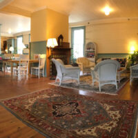 On the National Register of Historic Places, The Balsam Mountain Inn appears much as it did when constructed over a century ago. The 42,000 square foot Inn was once serviced by passenger rail. Extra wide hallways were built to accommodate the steamer trunks accompanying wealthy visitors.