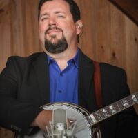 Aaron McDaris with Rhonda Vincent & The Rage at the Gettysburg Bluegrass Festival (May 2017) - photo by Frank Baker