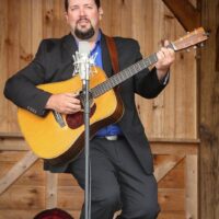 Aaron McDaris with Rhonda Vincent & The Rage at the Gettysburg Bluegrass Festival (May 2017) - photo by Frank Baker