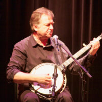Jens Kruger with The Kruger Brothers at The Rose State College Hudiburg Center - photo by Pamm Tucker
