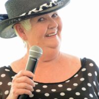 MC Jo Odom at the 2018 Florida Bluegrass Classic - photo © Bill Warren copy