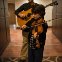 Hallway jam at the 2018 DC Bluegrass Festival - photo by Jeromie Stephens