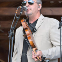 Glen Harrell with Volume Five at the 2018 Chantilly Farm Bluegrass & BBQ festival - photo © Deb Miller