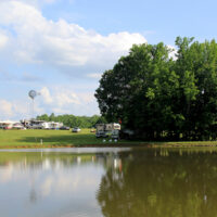 Lakeside view at the 2018 Lil John's Mountain Music Festival - photo by Laura Tate Photography Lakeside view at the 2018 Lil John's Mountain Music Festival - photo by Laura Tate Photography