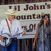 Cindy Baucom joins The Dukes Of Drive at the 2018 Lil John's Mountain Music Festival - photo by Laura Tate Photography Cindy Baucom joins The Dukes Of Drive at the 2018 Lil John's Mountain Music Festival - photo by Laura Tate Photography