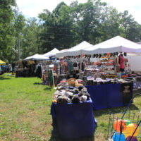 Vendor row at the 2018 Lil John's Mountain Music Festival - photo by Laura Tate Photography Vendor row at the 2018 Lil John's Mountain Music Festival - photo by Laura Tate Photography