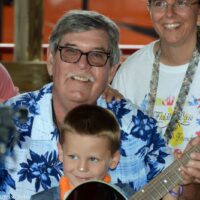 Jameson Yennoir with the guitar he won at the Marshall Bluegrass Festival