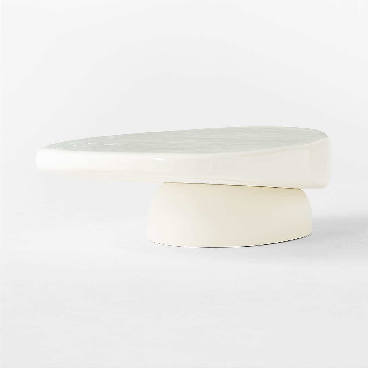 CB2 Alastor Oval High-Gloss White Concrete Coffee Table | Seeded