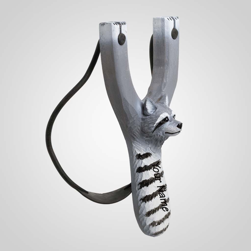 63549IM - Carved Wood/PVC Raccoon Slingshot, Name Drop