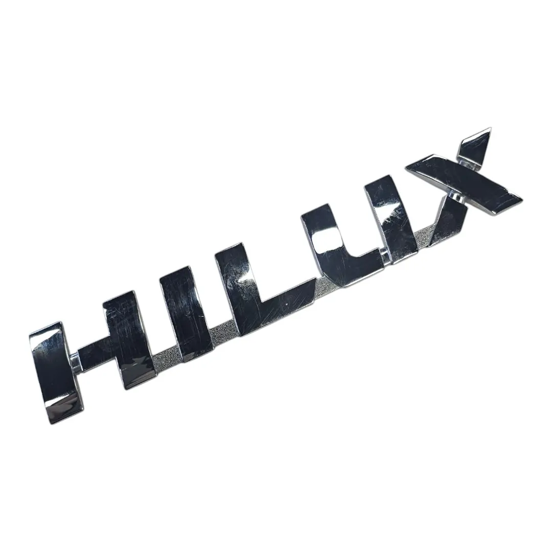 Emblema porta dianteira direita Hilux 2.8 2024 Manual 0km