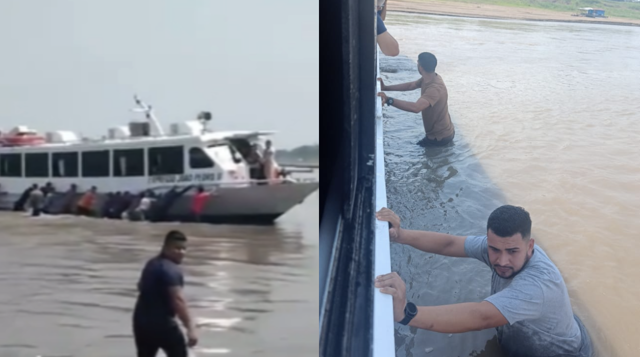 Lancha bate em banco de areia e passageiros empurram embarcação