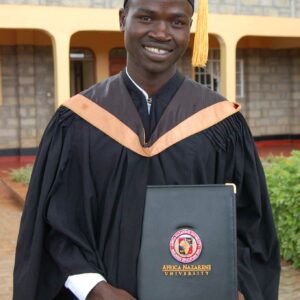 photo: young man with college diploma