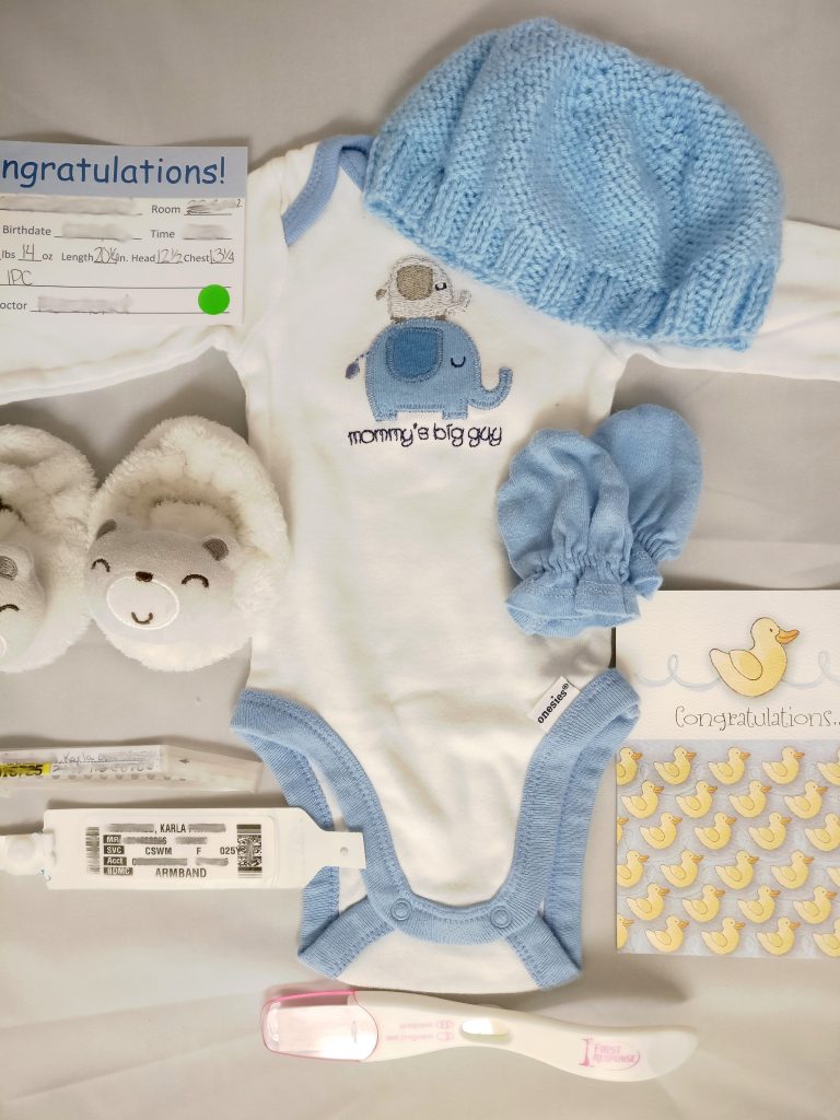 DIY Baby Shadow Box Items baby, shadow, box, craft, diy, do it yourself, outfit, card, footprint, pregnancy test, hospital, bracelet, newborn, details, hat, onesie, mittens, display, memories, parenthood, motherhood, babyhood, infant, fatherhood, blue, awesome, lifestyle, home, momblogger