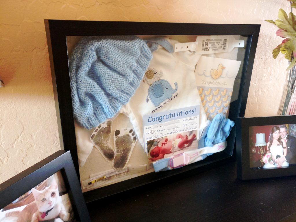 baby, shadow, box, craft, diy, do it yourself, outfit, card, footprint, pregnancy test, hospital, bracelet, newborn, details, hat, onesie, mittens, display, memories, parenthood, motherhood, babyhood, infant, fatherhood, blue, awesome, lifestyle, home, momblogger