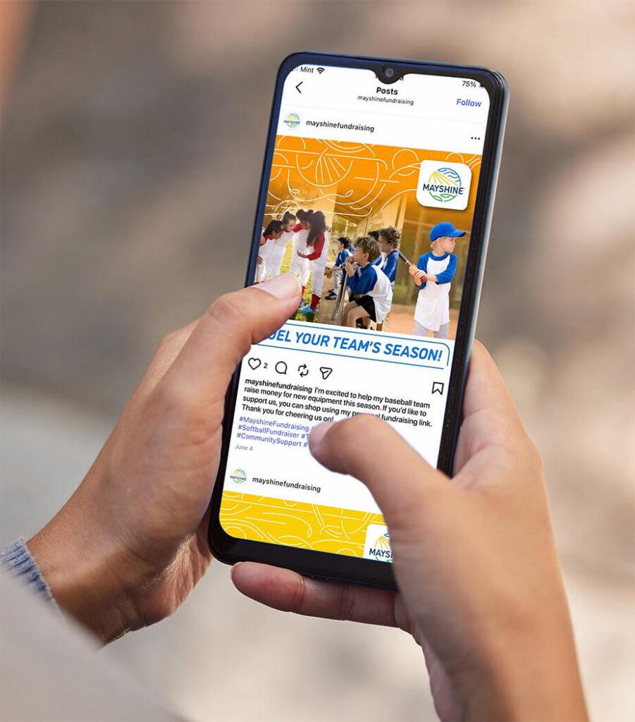 A mobile & social media fundraising tool - person holding a phone displaying a personalized social media post to promote a local fundraiser.