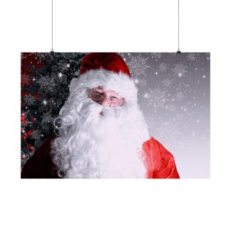 Framed photo of Santa Claus above a brown sofa. Santa has a white beard and red hat, with a snowy tree and starry background, creating a festive ambiance.