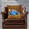 Brown pillow with “Autumn Harvest” text. Features a vintage blue truck with pumpkins, sunflowers, and a scarecrow, evoking a warm, rustic autumn feel.