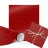 Red velvet style Christmas wrapping paper features a beautiful pattern of red velvety looking squares. A wrapped gift and a rolled section are shown.