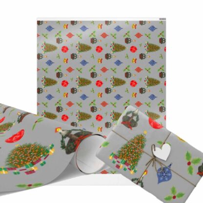 Festive Christmas wrapping paper with Christmas tree and ornament pattern on a gray background. Trees are adorned with colorful decorations. Gift wrapped with twine and heart tag.