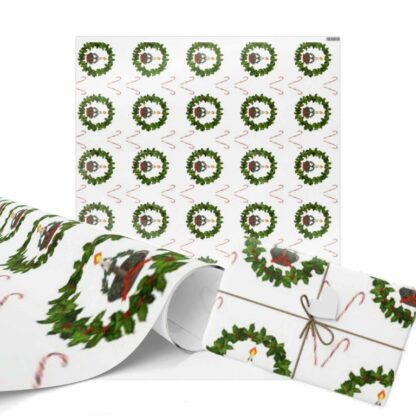 Festive Christmas wrapping paper featuring green holiday wreaths with candles, brown bells, and red ribbons, interspersed with candy canes on a white background.