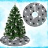 Gray Christmas tree skirt featuring a pattern of alternating white and black deer silhouettes. The design is split with a cut from the outer edge to a central circle.