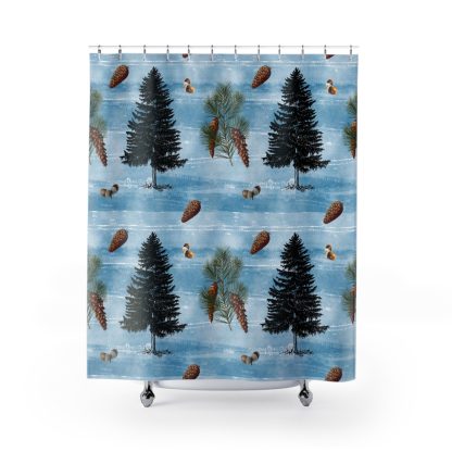Shower curtain with black evergreen trees, pinecones, acorns, and pine branches on a soft blue background, evoking a serene, wintry forest scene.