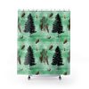 Shower curtain with a festive pattern featuring black pine trees, pinecones, and acorns on a textured green background. A serene, natural theme.