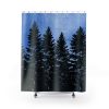 Shower curtain featuring black silhouettes of tall pine trees against a twilight blue sky, evoking a calm, serene forest scene.