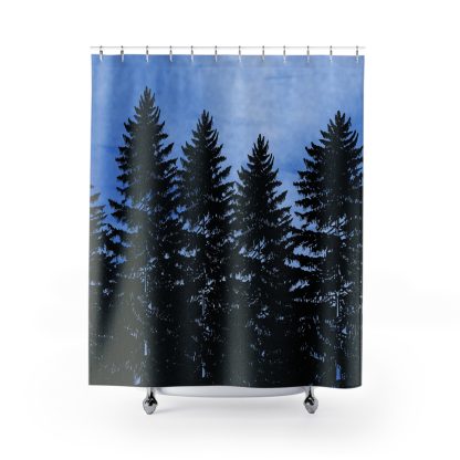 Shower curtain featuring black silhouettes of tall pine trees against a twilight blue sky, evoking a calm, serene forest scene.