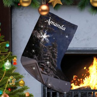 Christmas scene with a decorated tree on the left and a cozy fireplace on the right. A personalized stocking with "Amanda" hangs above, creating a festive, warm atmosphere.