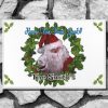 Holiday themed welcome mat with Santa Claus pointing, surrounded by a holly wreath. Text reads "Have You Been Good?" and "The Smith's." Festive and cheerful.