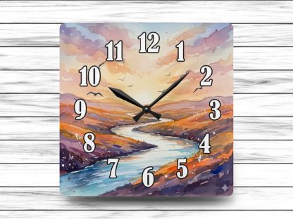 Wall-mounted watercolor clock with scenic design. A battery operated home gift that adds artistic charm and nature-inspired style to any room.