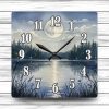 Wall-mounted watercolor moon clock. A battery operated home gift that adds soft celestial charm and artistic style to any room.
