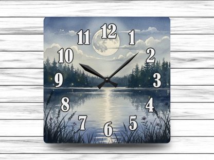 Wall-mounted watercolor moon clock. A battery operated home gift that adds soft celestial charm and artistic style to any room.
