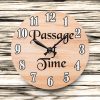 Round wooden clock with black hands, Arabic numerals, and "Passage of Time" in elegant script. Background is wood with dark grain.