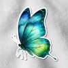 A vibrant, blue and green butterfly sticker with detailed wings is placed on a soft, white textured fabric, creating a serene and delicate contrast.