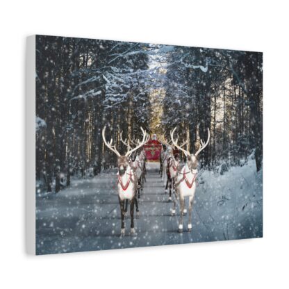 Santa Claus's Reindeer pulling a red sleigh through a snowy forest, with softly falling snow creating a festive, serene Christmas winter scene. The image evokes a magical and joyful holiday spirit. Printed canvas wall art.