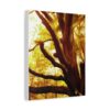 A large canvas painting of a tree with thick branches, set against a glowing golden background,