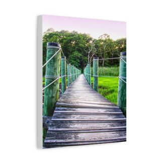 Canvas wall art of a wooden bridge with green posts over lush grass