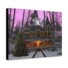Canvas wall art print with Victorian house in snowy forest, adorned with Christmas lights and wreaths. A decorated tree stands in front, with a vibrant purple sky above.