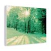 A vintage style canvas print of a winter forest scene with snow-covered trees and sunlight streaming through branches, casting long shadows