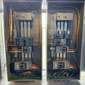 Electrical installation work by Sonoma Coast Electric, Inc featuring wires, junction boxes, and tools in a well-organized workspace.