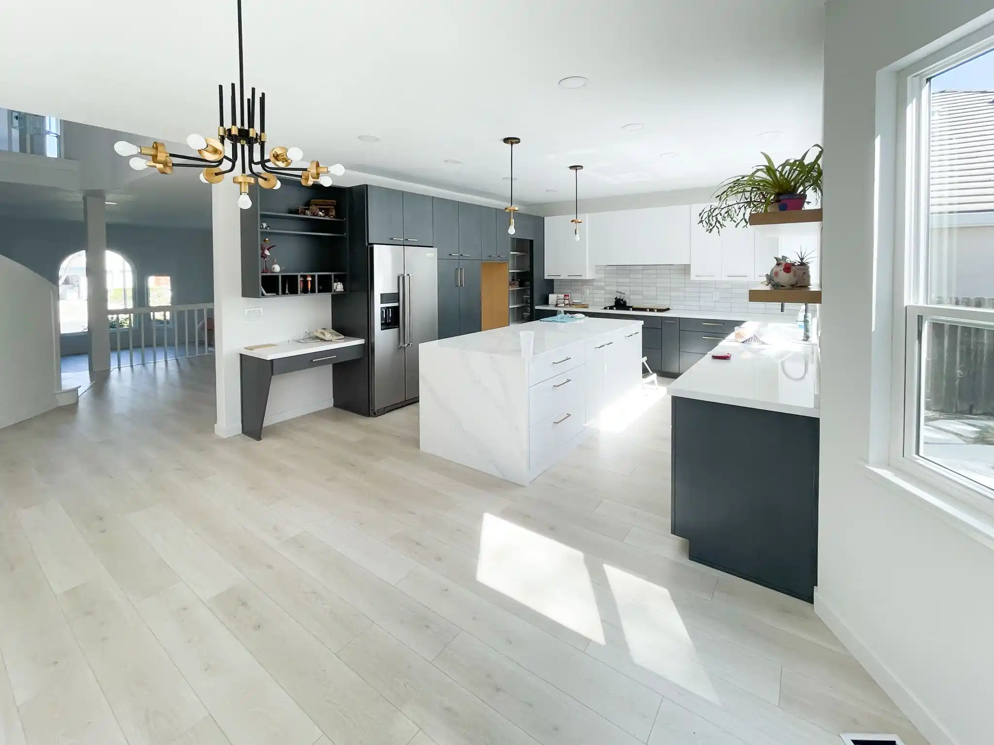 Renovated home exterior with modern design elements, showcasing quality siding, large windows, and a welcoming entrance in Roseville, CA.
