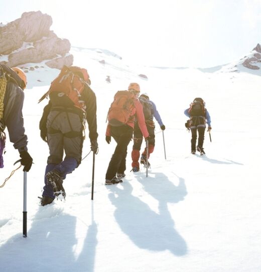 Team hiking in the snow