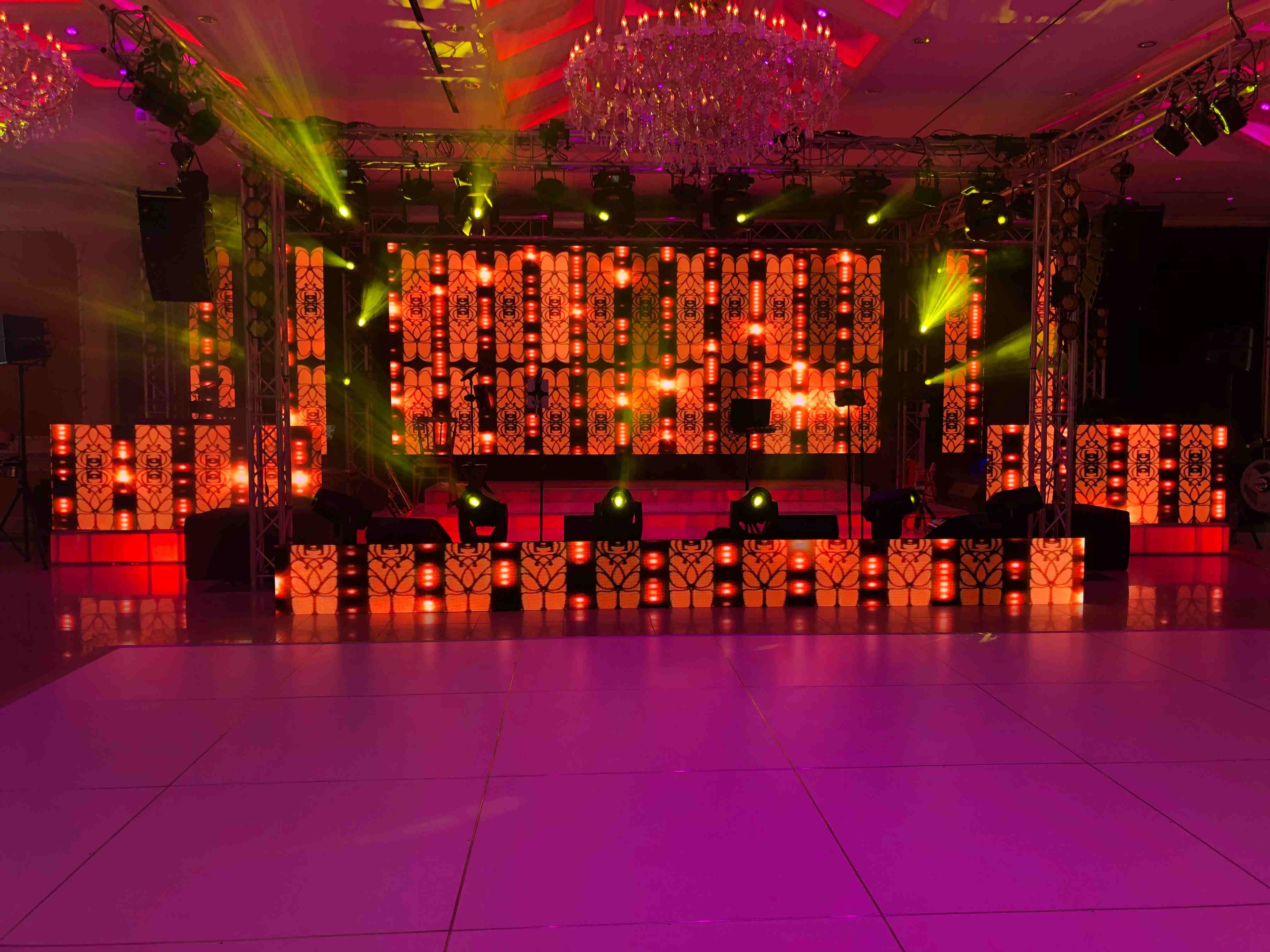 What are the benefits of implementing power factor correction in LED panel installations?