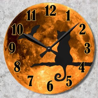 Silhouette of a cat and bat against a full moon, resembling a clock. Numbers encircle the moon, creating a mysterious and nocturnal atmosphere with a Halloween theme.