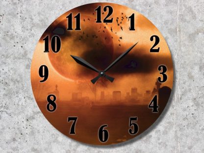 Round clock face with black numerals and hands. Background depicts an orange, eerie graveyard with a large moon, dark clouds, and flying bats.