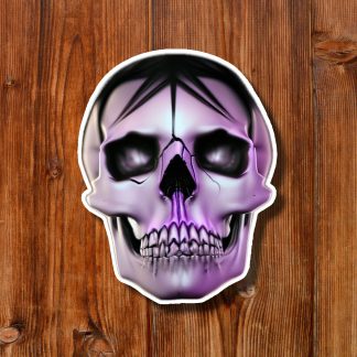 Stylized purple skull sticker with black eye sockets, bared teeth, and white outline centered on warm wooden planks, creating an eerie mood.