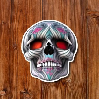 Decorative skull sticker with glowing red eyes, floral tattoo patterns, and bared teeth on a warm wooden plank background; eerie, gothic tone.