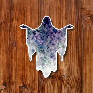 Watercolor ghost-shaped phantom sticker in purple, blue, and white, arms outstretched on a warm wooden plank background, creating a whimsical mood.